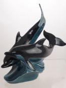 A Poole Pottery Figure of Dolphins, approx 24 cms high.