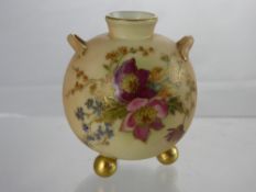A Royal Worcester Blush Ware Vase, of bulbous design supported on gilded ball feet hand painted with