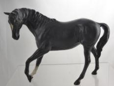 A Beswick Figure of a Black Stallion, approx 17 x 24 cms.
