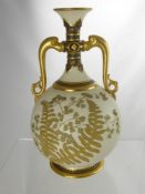 Royal Worcester Ivory Vase, with gilded ferns to body, floral spray with jewelled highlights, gilded
