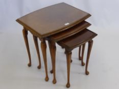 A Nest of Tables, with glass protectors.