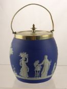 A Wedgwood Jasper Ware Biscuit Barrel, depicting a classical frieze, marks to base.