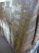 A Contemporary Woven Egyptian Throw, having tasselled edges, approx 240 x 240 cms