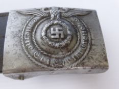 A WWII German Elite SS Bayonet, the blued blade no. 3102h and 43 crs, having a black bakelite