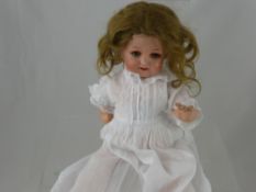 A Heubach-Koppelsdorf Porcelain Head Doll, No. 342/7 together with a vintage tin picture card viewer