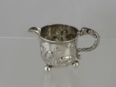 A Victorian Silver Creamer, embossed with Aesop's fable 'The Fox and the Crane