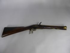 A Reily and Co., English Brass Barrelled Blunderbuss Circa 1810, walnut stock (slight damage) ,