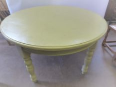 A Circular Cream-Painted Pine Table, approx 135 dia x 78 cms h, retailer Mulberry Pine, Suffolk