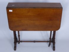 An Antique Mahogany Sutherland Drop Leaf Table, on turned legs approx 80 x 68 x 66 cms,