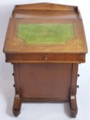 A Victorian Mahogany Inlaid Davenport.