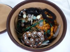 A Suede Lined Leather Jewellery Box, containing miscellaneous costume jewellery including beads,