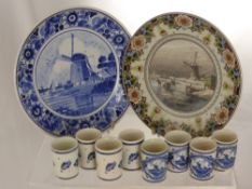 A Set of 8 Delft Spirit Shots, commissioned by the 