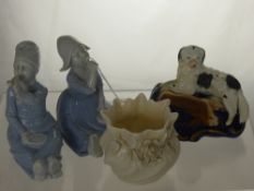 A Belleek Posy Vase with applied floral decoration together with two porcelain figurines depicting