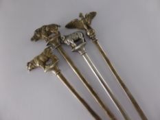 Four Continental Silver Metal Meat Skewers, depicting animals including the Prussian eagle, boar,
