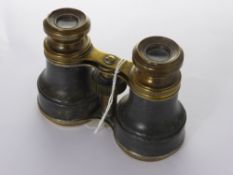 A Pair of Brass Opera Glasses, together with a pair of Dollond of London miniature binoculars in the