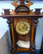 A Virana Mahogany Cased Wall Clock, with enamel and brass face and Roman dial, approx 64 x 30 cms