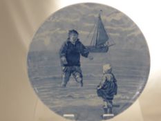 A Miscellaneous Collection of Three Plates, including Delft and Imari. (3)