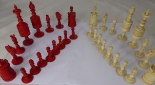 A Victorian Turned and Stained Antique Bone Chess Set, comprising of thirty two pieces in original