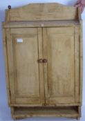 A Pine Kitchen Cupboard with shelf below, approx 55 x 90 x 20 cms.