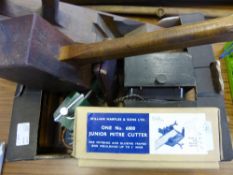A Collection of Wood Tools, to include plane (without blade), wood mallet and two wood mitre