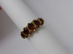 A Lady's 9 Ct 375 Hallmark Garnet Ring, size M, approx wt 3.1 gms.
