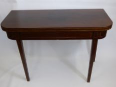 A Mahogany Tea Table, string inlay to front and legs, approx 109 x 91 x 79 cms.