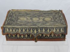 An Antique Leather and Vellum Quill Work Box, possibly to house a Holy Book, the lid of the box