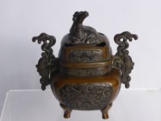 Japanese Meiji Period Bronze Koro and Cover, with stylized carp handles and mythological creature