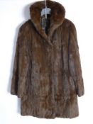 A Lady's Vintage Fur Car Coat.