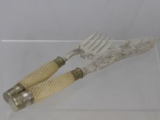 An Ivory Handled Fish Slice and Serving Fork, with marks to the fish slice.