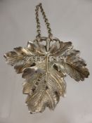 A Solid Silver Sherry Label in the Form of a Vine Leaf, London hallmark dd 1886, mm J.N.M., approx