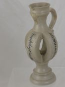 An English Stone Ware Puzzle Jug, inscribed Sudeley Castle with initials J.C.D. and A.D.M.D.ccc E