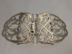 A Solid Silver Nurse's Buckle, Birmingham hallmark dd 1900, mm rubbed, the filigree form buckle