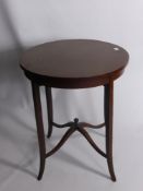 An Edwardian Inlaid Circular Tea Table.
