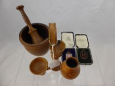 A Quantity of Treen, cruet set and a pestle and mortar together with a bronze Rifle Club medallion