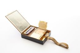A ladies 1920s Art Deco ‘parklane deLuxe’ compact by L.S. Meyer, of rectangular handbag form, with