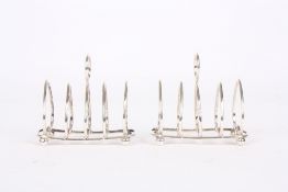 A pair of silver miniature heart shaped toast racks, hallmarked Birmingham, 1898, 2.37ozt, length
