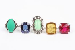 Five assorted ladies dress rings . Good condition.