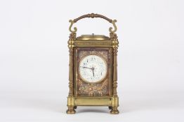 A 19th century French brass repeater carriage clock, the circular white enamel dial with stylised