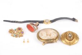 A collection of assorted jewellery, including a 9ct gold flower brooch set with semiprecious stones,