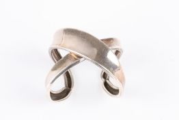 A continental silver twisted stuff bangle, stamped .925. 67 grams . Scratched and tarnished in