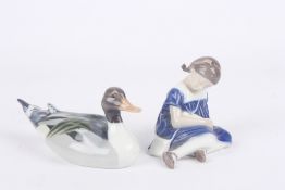 A Royal Copenhagen porcelain model of a mallard, together with a Bing & Grondahl figure of a