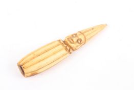An unusual 19th century ivory hand tool in the form of Punch or a Jester, with brass stud weighted