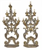 A pair of large carved and decorative gilt wood torcherespossibly late 18th century/early 19th