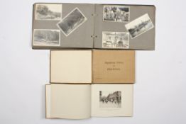 An album of photographs containing black and white photos of the far East, together with two