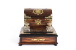 A coromandel and brass writing setthe part domed lid opening to reveal a compartmented interior for