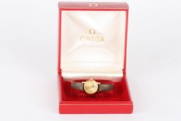 A ladies Omega wrist watchthe gilded dial with baton numerals, with 485 calibre movement and set in