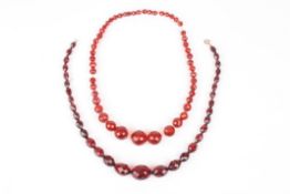 Two 1930s faceted bakelite necklaces, of graduated form.Dimensions: Condition reportGood condition.