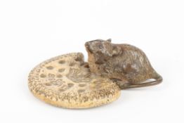 An early 20th century Austrian cold painted bronze mouse in the manner of Bergmanin a seated pose