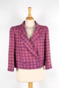 Two Chanel boucle jackets the first with purple and pink check, double breasted, two pockets to